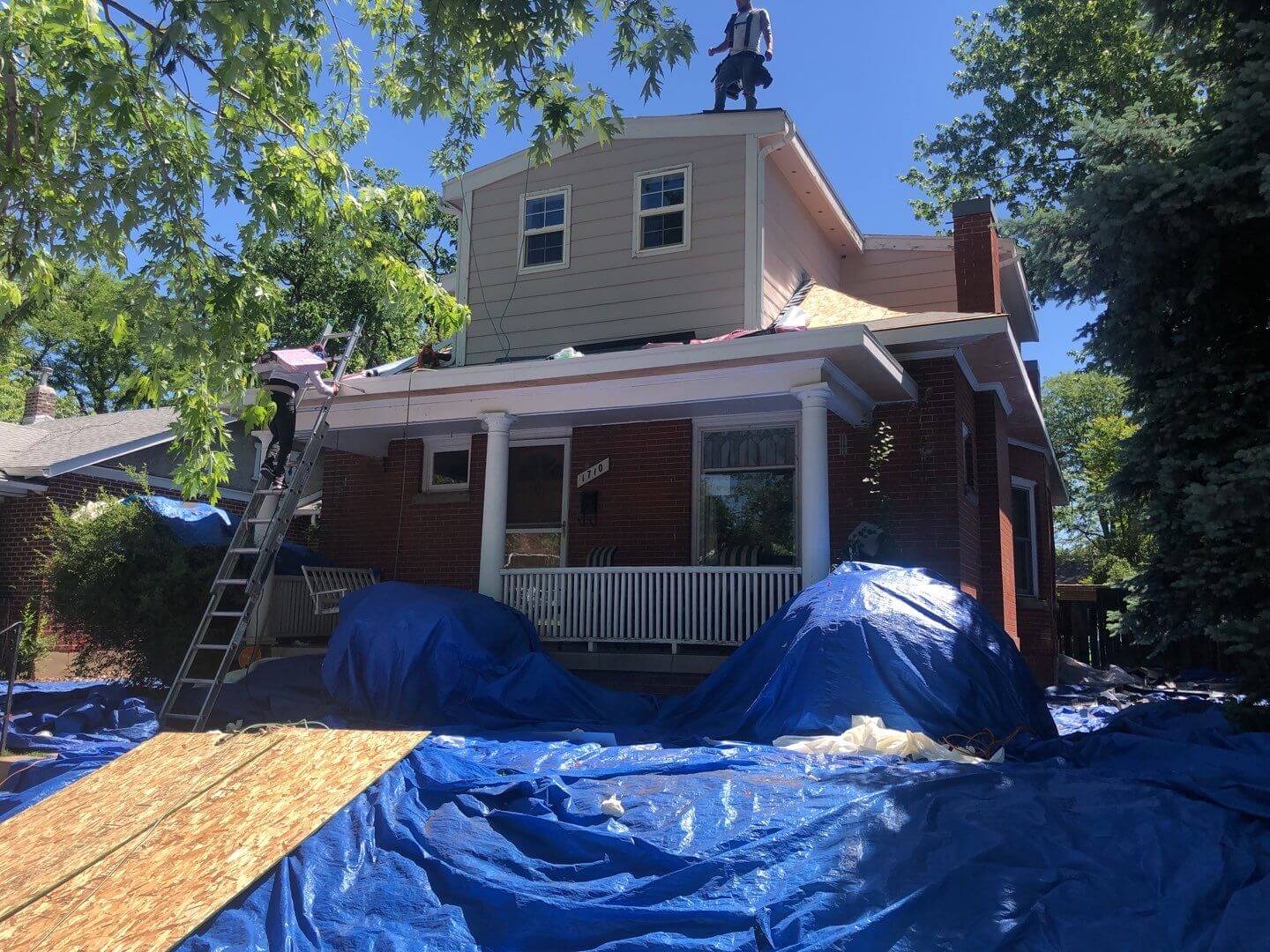 Roofing Contractor at work in Denver