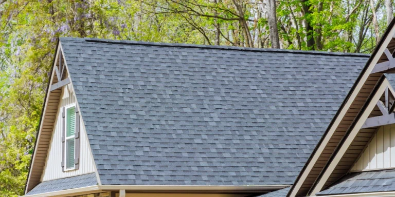 Close-up of a charcoal asphalt shingle roof on a residential home in Colorado