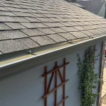 Newly installed asphalt shingle roof and gutter on a Denver, Colorado home by Red Diamond Roofing